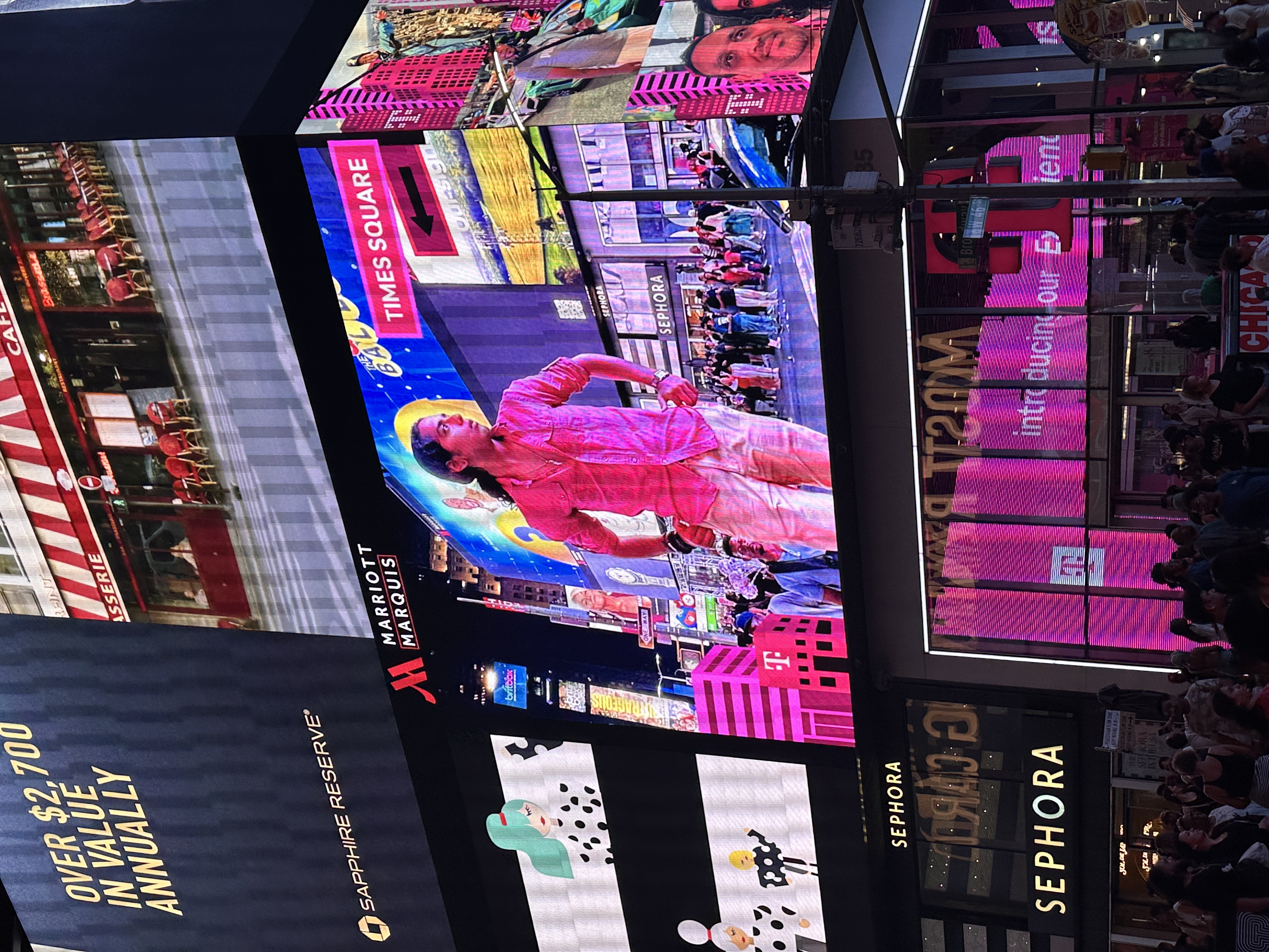 A billboard in Times Square featuring Aryan Rohira’s portrait